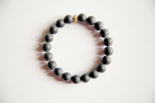 Load image into Gallery viewer, Matte Black Onyx Bracelet with a Gold Filled Charm