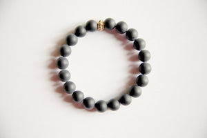 Matte Black Onyx Bracelet with a Gold Filled Charm