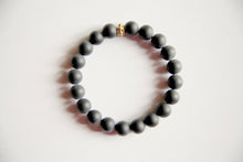 Load image into Gallery viewer, Matte Black Onyx Bracelet with a Gold Filled Charm